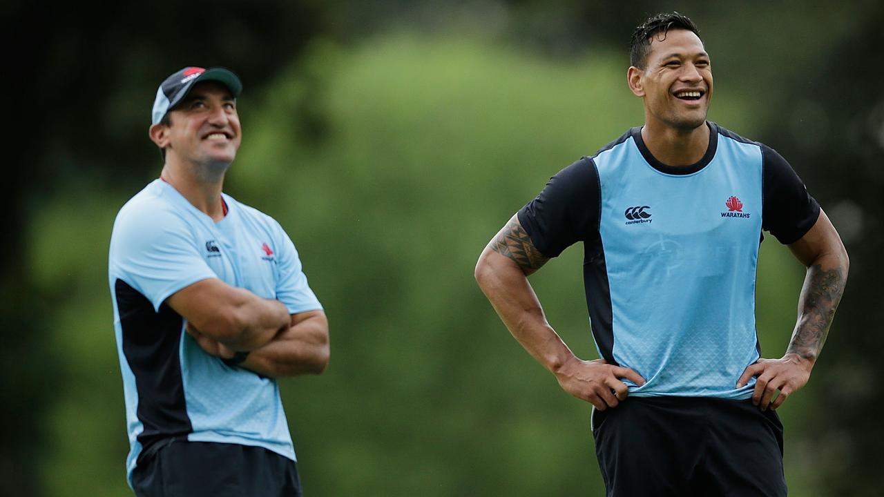 Waratahs coach Daryl Gibson and Israel Folau smile during a training session.