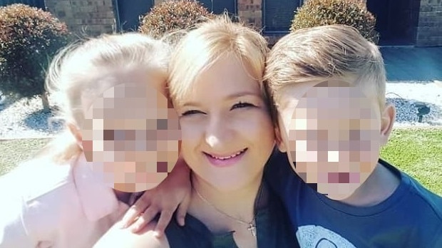 Blakeview woman Jess DeWet, who says she was "coward punched" while walking to her car, with her children. Picture: Supplied