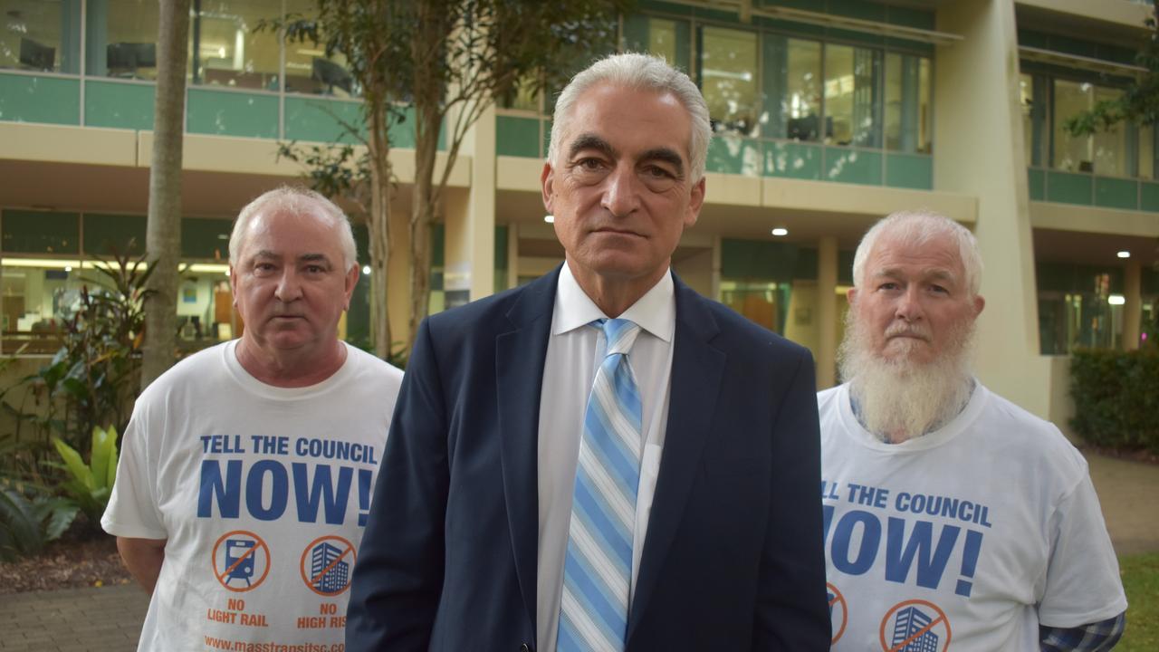 Councillor Joe Natoli, pictured with protesters against light rail, wants more information on the council’s investigations into the future use of the Kawana industrial area. Picture: Tegan Annett