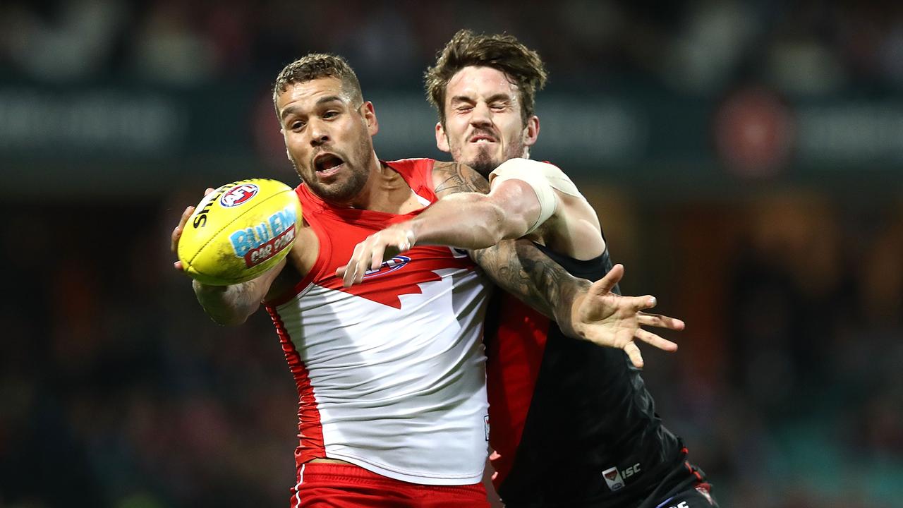 Michael Hartley attempts to spoil Sydney superstar Lance Franklin.