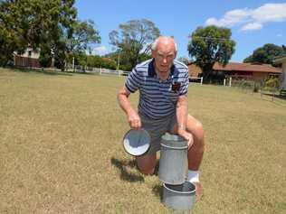 Rex Baguley checks for rain at his Dragon St home in Warwick this year. Picture: Gerard Walsh