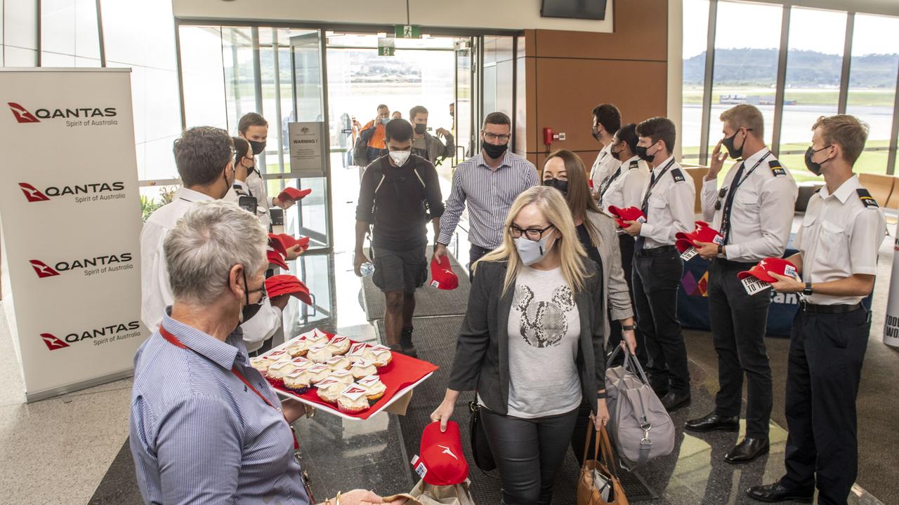 Passengers arrive on the first QANTAS flight from Sydney to land at Wellcamp Airport for two years. Picture: Nev Madsen.