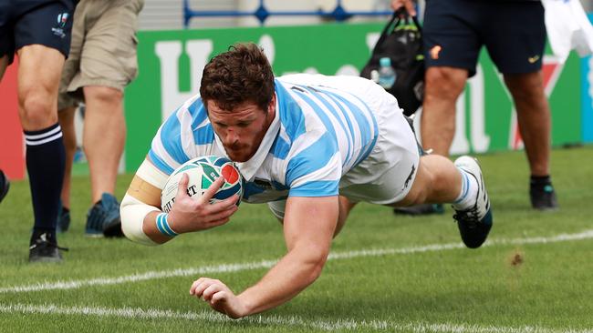 Argentina hooker Julian Montoya dives over to score against Tonga. Picture: Getty Images