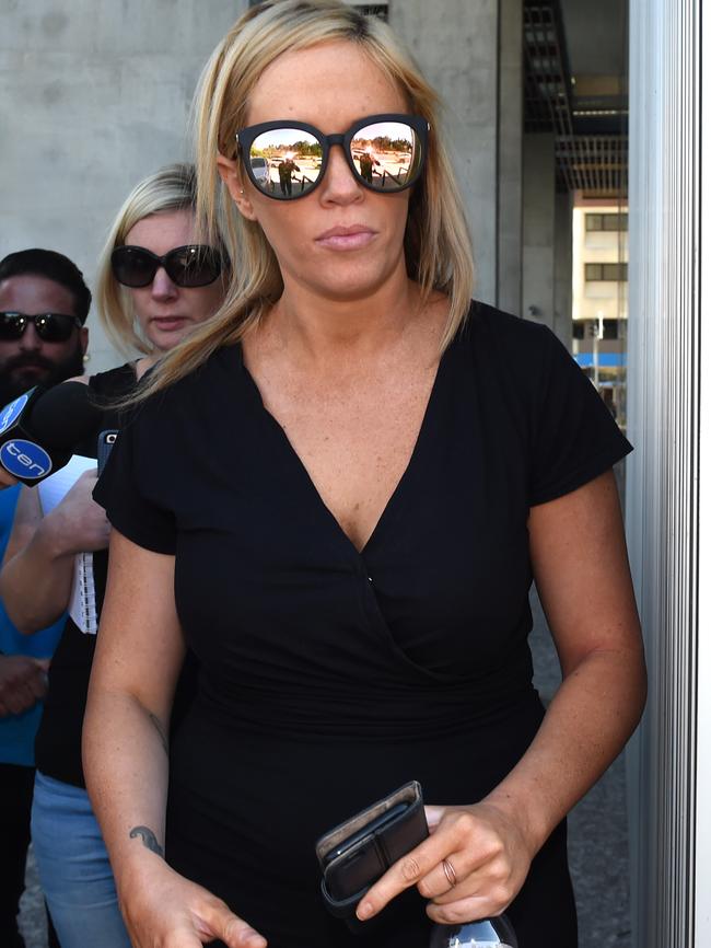 Richelle Kadadi, ex partner of former Brisbane Lions player Albert Proud, leaving the District Court in Brisbane. AAP Image/Dan Peled