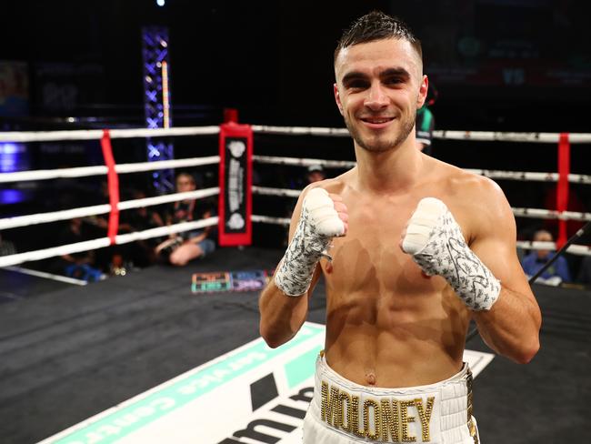 Andrew Moloney celebrates winning against Selmani Bangaiza at the Seagulls Club at Tweed Heads on June 15. (Photo by Chris Hyde/Getty Images)