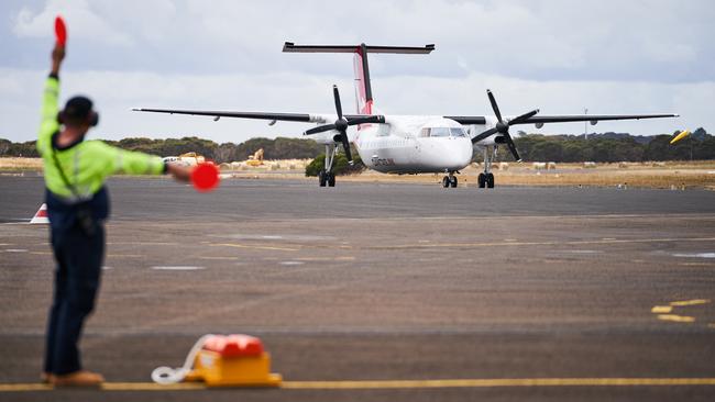 The first QantasLink airplane from Adelaide arrives at Kingscote Airport on Kangaroo Island on Monday, December 4, 2017. Picture: Matt Loxton