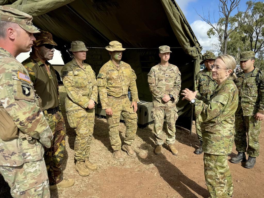 The shadow Assistant Minister for Education and the member for Forrest, Nola Marino chatting to soldiers from the Australian Defence Force, Japanese Self-Defense force and U.S. Army while visiting the Townsville Field Training Area for Exercise Brolga Run 2024. Photo: Major Taylor Lynch