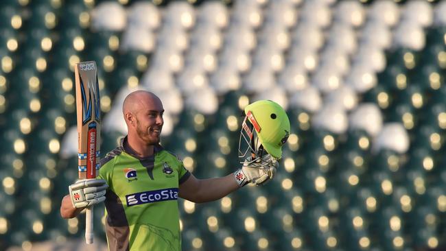 Chris Lynn celebrates after scoring a century for Lahore in the Pakistan Super League just days before the sport shutdown last month Picture: AFP