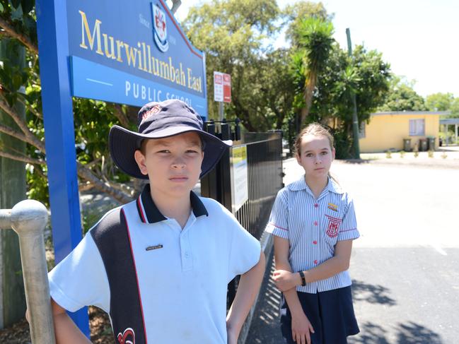 Murwillumbah East Public School students Isaac Rose, Year 6, and Zoe Johnson, Year 5, are unhappy with the state government's plans to merge four schools into one mega-facility. Picture: Liana Boss