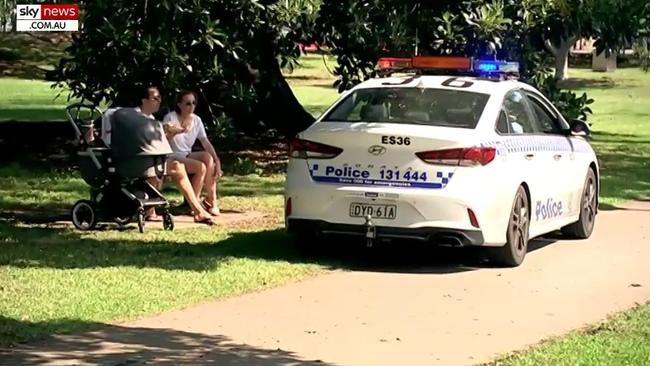 A police car drives through a park in Rushcutters Bay, eastern Sydney. Picture: Sky News