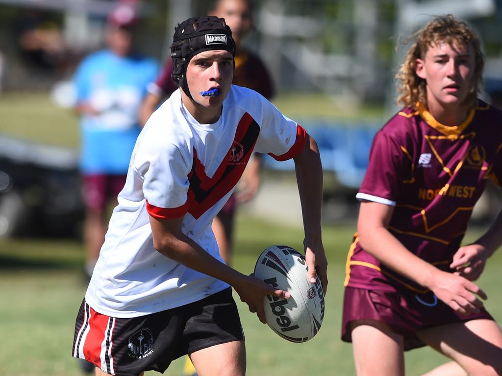 Boys Rugby League State Championship held at Northern Division, Brothers Leagues ground, Townsville. Northwest (maroon) v Wide Bay (white) 14-15 years. Billy Roderick of Xavier Catholic College.