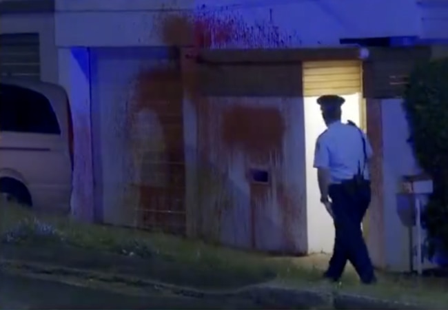 A police officer at the crime scene.