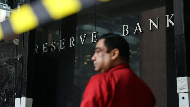 Signage at the Reserve Bank of Australia (RBA) building in Sydney, Australia, on Thursday, April 20, 2023. Australia's central bank should set up an expert policy board, hold fewer meetings and give press conferences explaining its decisions, according to recommendations from an independent review that would align it. Photographer: Brendon Thorne/Bloomberg