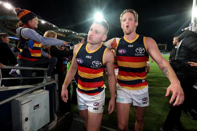 Adelaide’s Rory Laird and Rory Sloane celebrate their win against Port Adelaide at Adelaide Oval. Picture: James Elsby/Getty