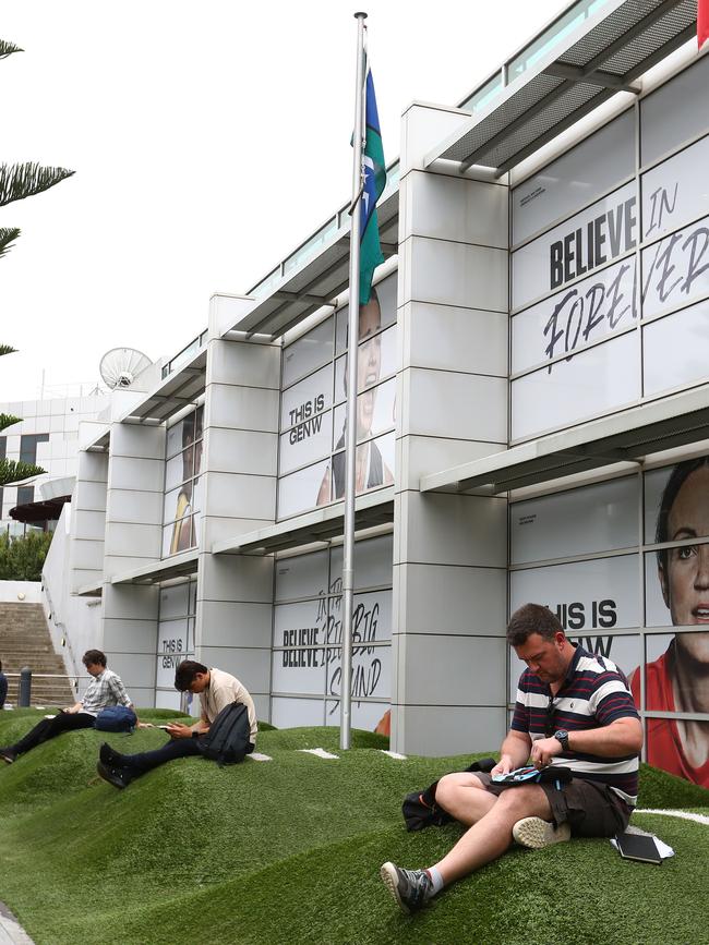 Media wait in front of AFL House for an announcement about the season. Picture: Getty Images