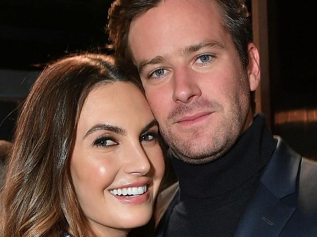 FILE - JULY 10: Actors Armie Hammer and Elizabeth Chambers have announced they are getting a divorce after 10 years of marriage. NEW YORK, NY - FEBRUARY 07:  Actors Elizabeth Chambers (L) and husband  Armie Hammer pose for a photo at BOSS Menswear - Front Row at New York Fashion Week Mens' on February 7, 2018 in New York City.  (Photo by Mike Coppola/Getty Images)