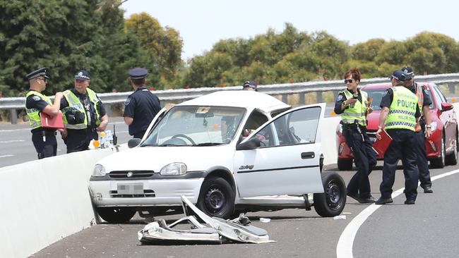 A man was seriously injured in this crash on the Southern Expressway, which police say was possibly a street race between the damaged car and a stolen Mercedes on Monday. Picture: Stephen Laffer