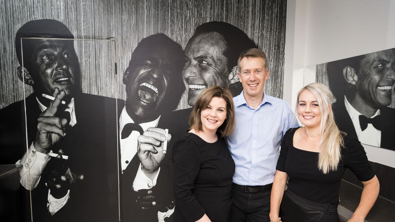 Susan and Joel Watson of Joel's Barber Shop with Chloe Handley (right) are packing up the Margaret St shop and moving to a new venture at the Eastville Shopping Centre on the range, Wednesday, April 5, 2023. Picture: Kevin Farmer