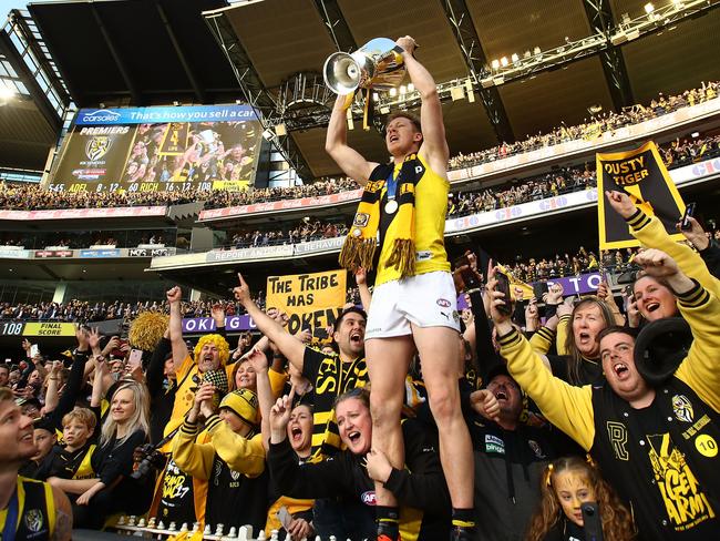 Jack Riewoldt of the Tigers celebrates with fans after winning the 2017 AFL Grand Final