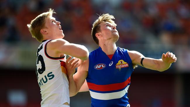 Crows top-10 pick Fischer McAsey (left) stepped away from the AFL this month. Picture: Matt Roberts/AFL Photos/via Getty Images