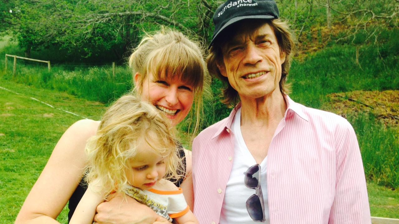 Amber and Sage Ochota with Sir Mick Jagger . Picture: Supplied