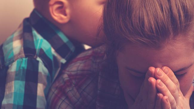 Alicia was mourning her mum when her son cut up old family photos. Photo: iStock