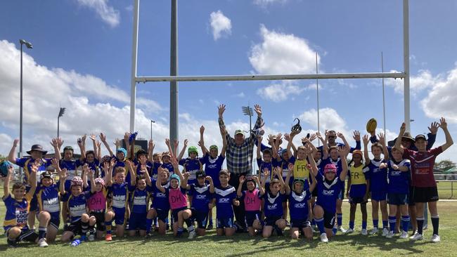 Steve Jackson with junior rugby league players at the Gala Day on Friday. Photo: Toby Crockford.