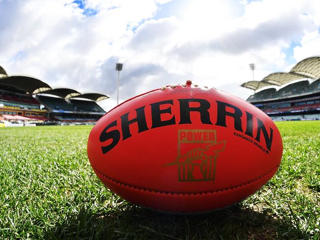 ADELAIDE, AUSTRALIA - JULY 15:  A Sherrin football is pictured on Adelaide Oval from the southern end prior to the round 17 AFL match between the Port Adelaide Power and the North Melbourne Kangaroos at Adelaide Oval on July 15, 2017 in Adelaide, Australia.  (Photo by Daniel Kalisz/Getty Images)