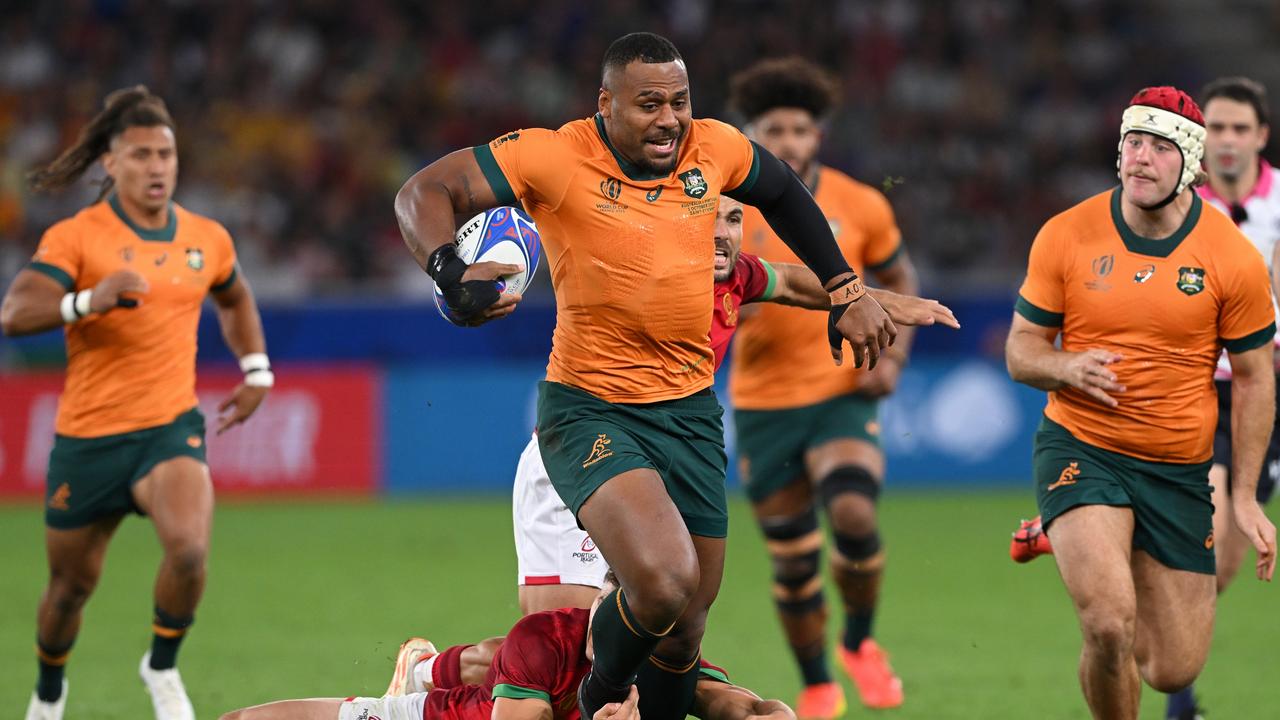 Australia’s Samu Kerevi makes a break during the Rugby World Cup match against Portugal. Picture: Stu Forster/Getty Images
