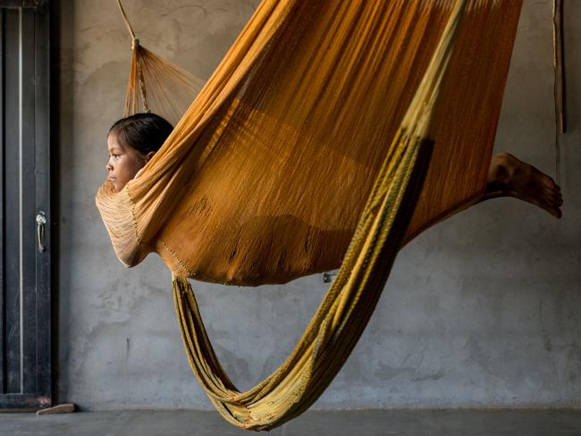 Wendy in Orocué ... Wendy Daniela Rivas, looks through a window from her home at Orocué, Casanare, Colombia. Picture: Juan Cristóbal Cobo, Colombia, 3rd Place, National Awards, 2017 Sony World Photography Awards