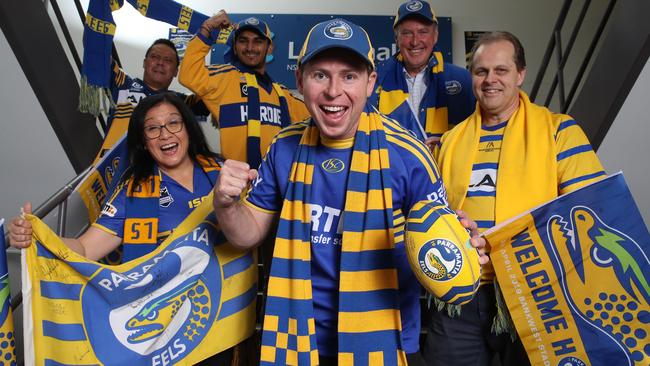 Eels fans Zay Yar, Sharon Hardwick, Mehul Batel, Justin Daley, Ian Dixon and Gary Hockley can’t wait for the footy. Photo: David Swift