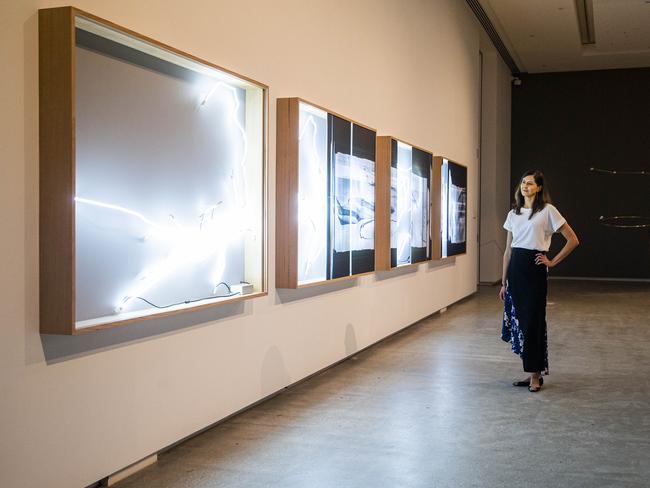 Nina Miall in front of <i>Flow Equation, </i>2021, by James Geurts. Picture: Aaron Francis