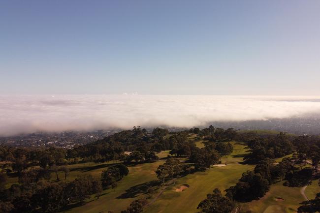 Drone view of the fog from above the Mount Osmond golf course at about 10:30am on July 14. Picture: Peter Gleeson,