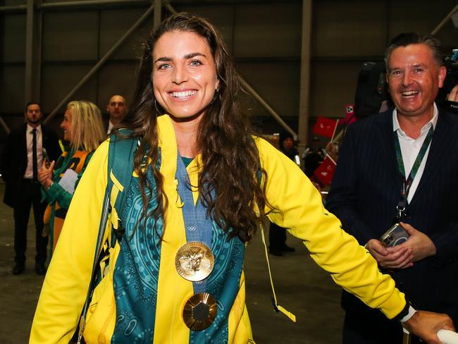 SYDNEY, AUSTRALIA : NewsWire Photos- AUGUST 14 2024; The Australian Olympic Team Jess Fox won gold in kayaking is the first off the plane arriving home into Sydney on Qantas from Paris and are greeted with a special welcome home ceremony with Prime Minister Anthony Albanese,  Qantas Group CEO Vanessa Hudson, Chef de Mission Anna Meares and athletes' families with a special performance by Jessica Mauboy at Sydney airport. Picture: NewsWire / Gaye Gerard