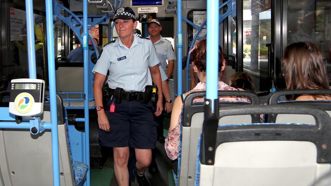 Police patrolling Surfside buses.