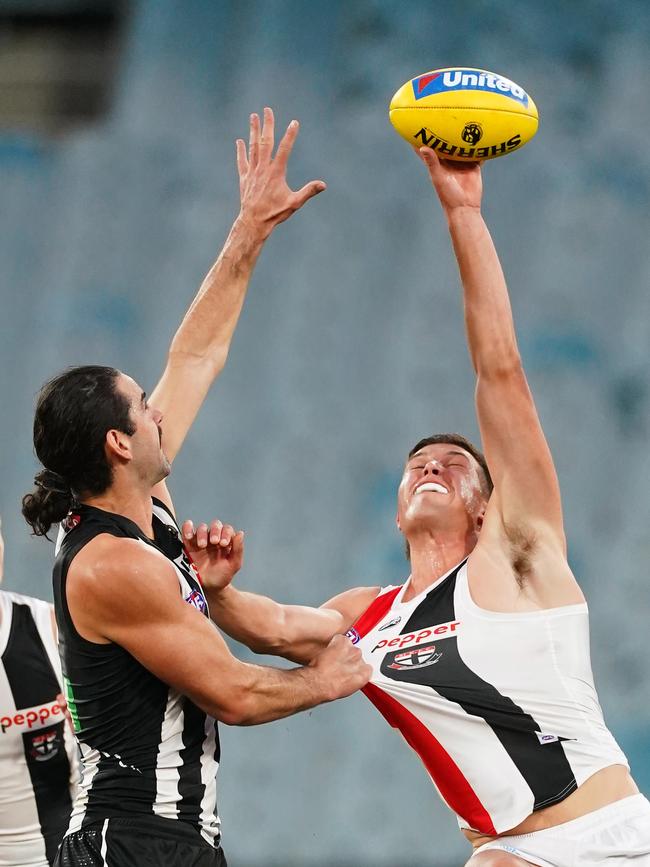 Brodie Grundy and Rowan Marshall compete for the ball. Picture: Scott Barbour/AAP