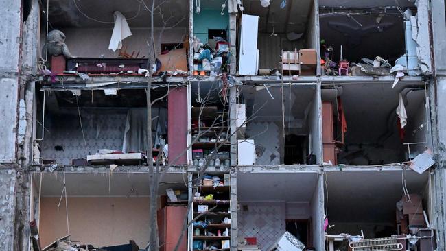 Apartments in a residential building were heavily damaged as a result of a missile strike in Kharkiv. Picture: AFP