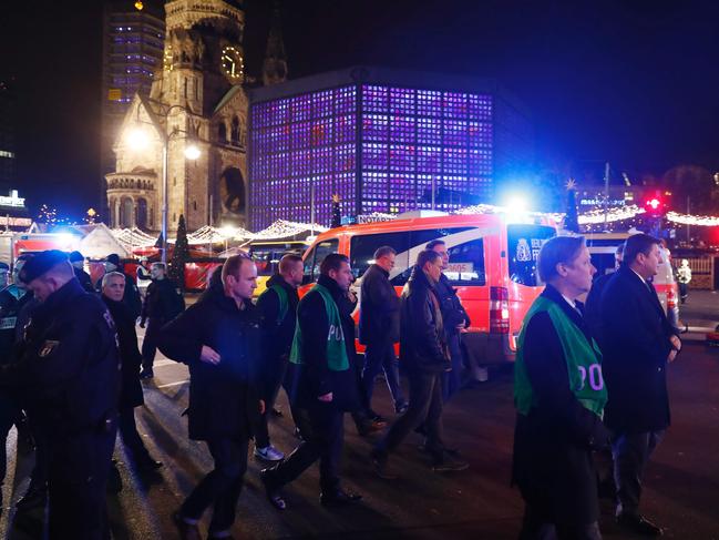 Berlin’s mayor Michael Mueller walks at the site where a truck speeded into a christmas market in Berlin, on December 19, 2016. Picture: AFP