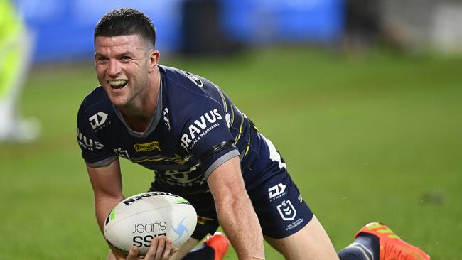 TOWNSVILLE, AUSTRALIA - AUGUST 19:  Chad Townsend of the Cowboys celebrates after scoring a try  during the round 23 NRL match between the North Queensland Cowboys and the New Zealand Warriors at Qld Country Bank Stadium, on August 19, 2022, in Townsville, Australia. (Photo by Ian Hitchcock/Getty Images)