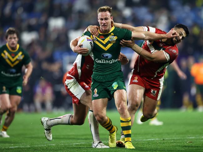 Daly Cherry-Evans busts through some would be defence from Lebanon. Picture: Michael Steele/Getty Images