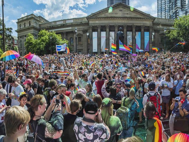 Thousands celebrate at the same-sex marriage result on the steps of the State Library of Victoria. Picture: Jason Edwards