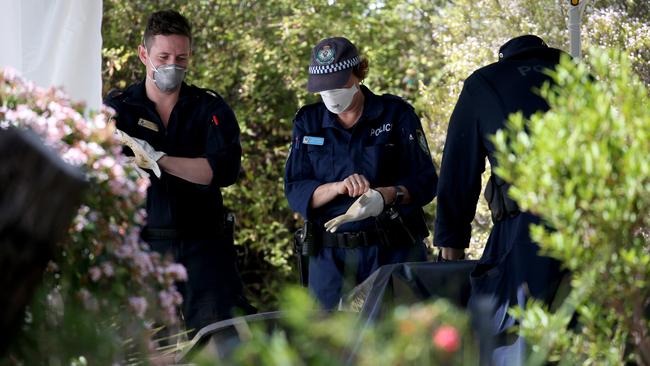 NSW Police from the NSW homicide squad conduct a forensic search at the home of Lynette Joy Dawson's former home at Bayview. Hollie Adams/The Australian