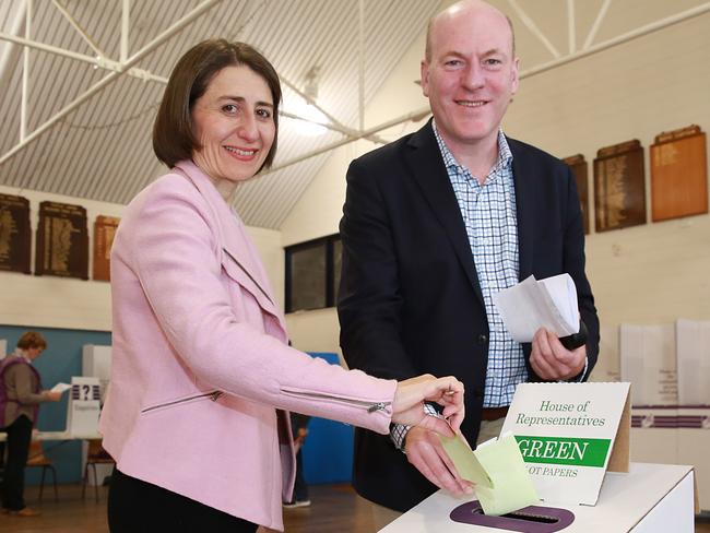 Trent Zimmerman and Gladys Berejiklian cast their vote at Willoughby Public School this morning. AAP IMAGE / MARK SCOTT