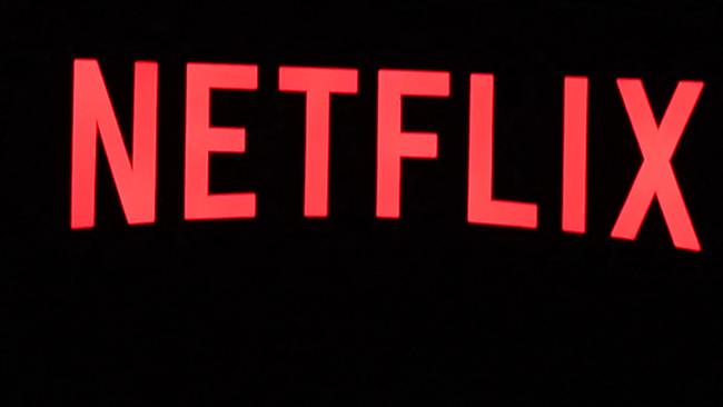 (FILES) In this file photo taken on October 19, 2021 the Netflix logo is seen on the Netflix, Inc. building on Sunset Boulevard in Los Angeles, California. - Netflix on January 19, 2023 said global subscribers to its streaming service jumped to more than 230 million people in the last three months of last year as hits such as "Wednesday" and "Harry & Meghan" drew in new viewers. (Photo by Robyn Beck / AFP)