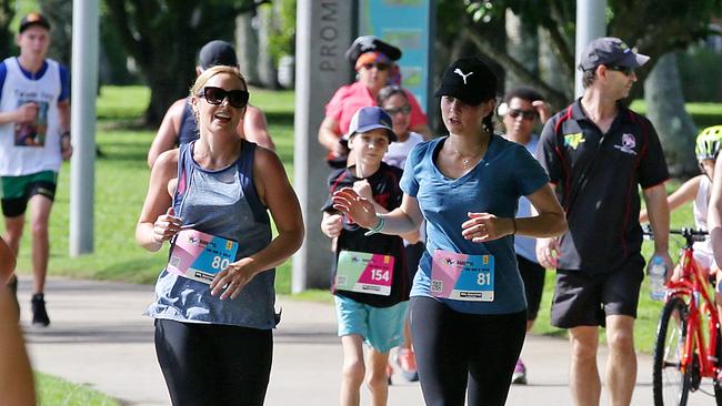 Jackie Harley-Baines and Danyell Munro complete a run. Cairns Esplanade. PICTURE: JUSTIN BRIERTY