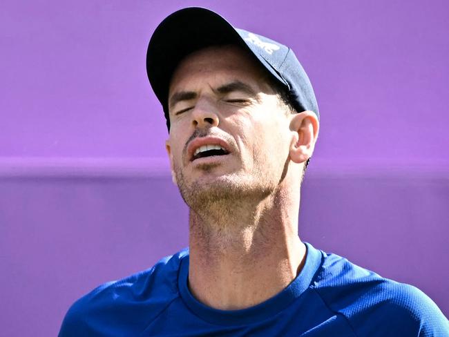 Britain's Andy Murray reacts as he plays against Australia's Jordan Thompson during their men's singles round of 16 match at the Cinch ATP tennis Championships at Queen's Club in west London on June 19, 2024. (Photo by Ben Stansall / AFP)