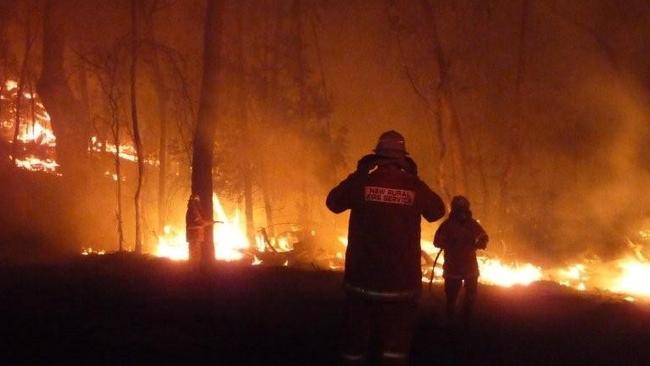 Firefighters battling the blaze at Dederang near Marysville. Picture: Karen Randall