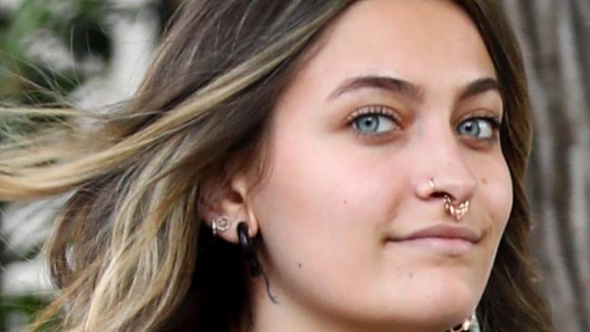 AU_1953989 - Los Angeles, CA  -  *EXCLUSIVE*  - Paris Jackson steps out showing off a new neck tattoo. The neck tattoo is some sort of writing on her neck is still slightly pink from the fresh tattoo.  Pictured: Paris Jackson  BACKGRID Australia 27 JUNE 2020   Phone: + 61 419 847 429 Email:  sarah@backgrid.com.au *CLIENT RESTRICTION APPLIED*