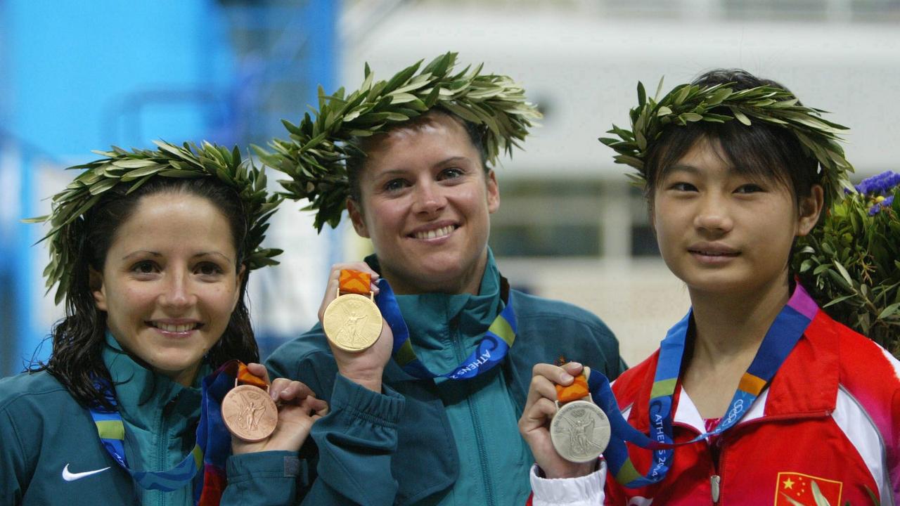 Chantelle Newbery (centre) after winning gold in Athens (Photo by Andreas Rentz/Bongarts/Getty Images)