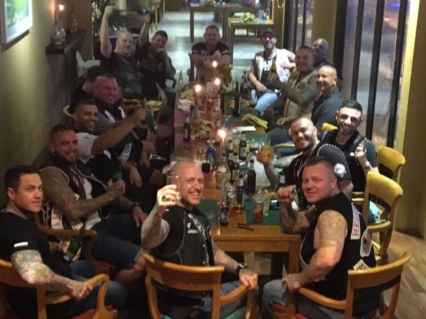 Soukoulis (fourth right from rear) in a Phuket restaurant with a group of senior Hells Angels.